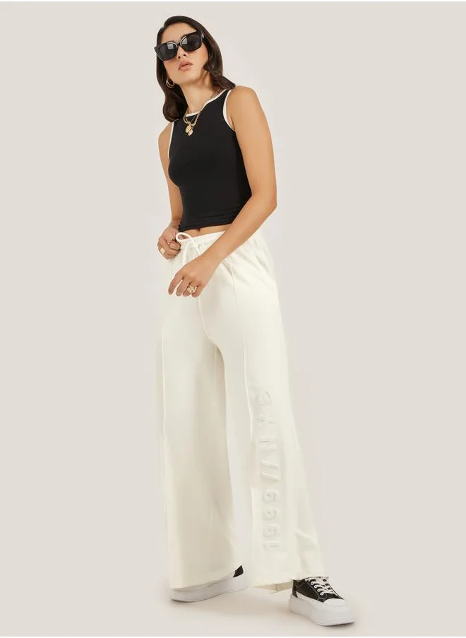 Styli Embossed Hem Wide Leg Joggers with Drawstring Waist