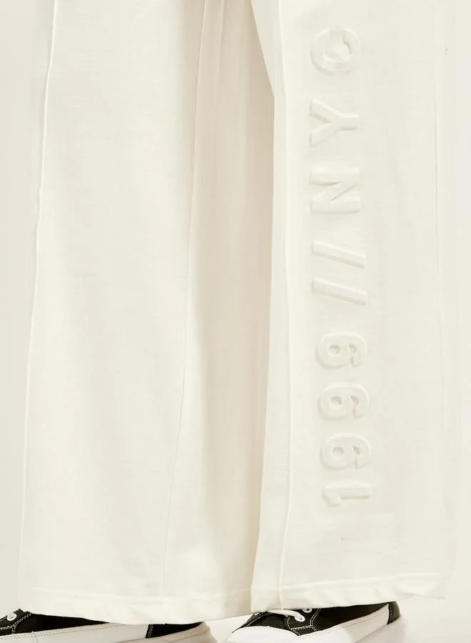 Styli Embossed Hem Wide Leg Joggers with Drawstring Waist
