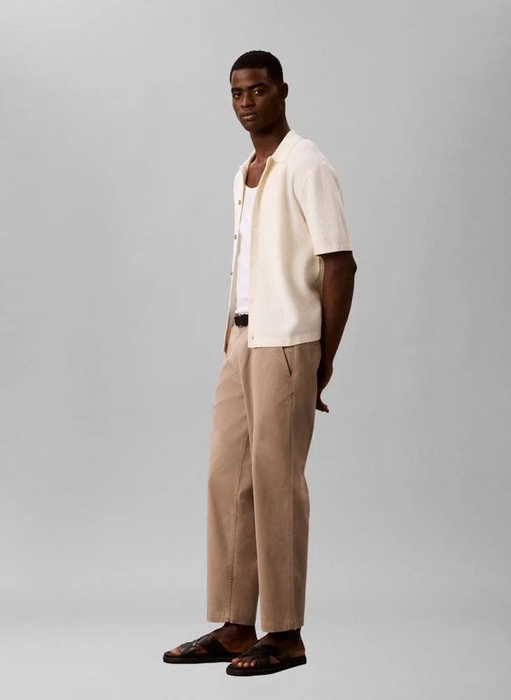 Calvin Klein Jeans Roasted Cashew 90s Loose Cropped Chino Trousers for Men | Best Price UAE