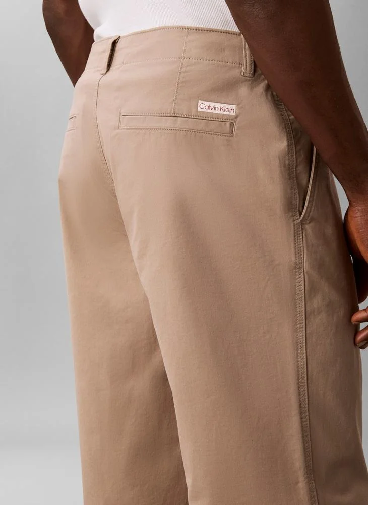 Calvin Klein Jeans Roasted Cashew 90s Loose Cropped Chino Trousers for Men | Best Price UAE