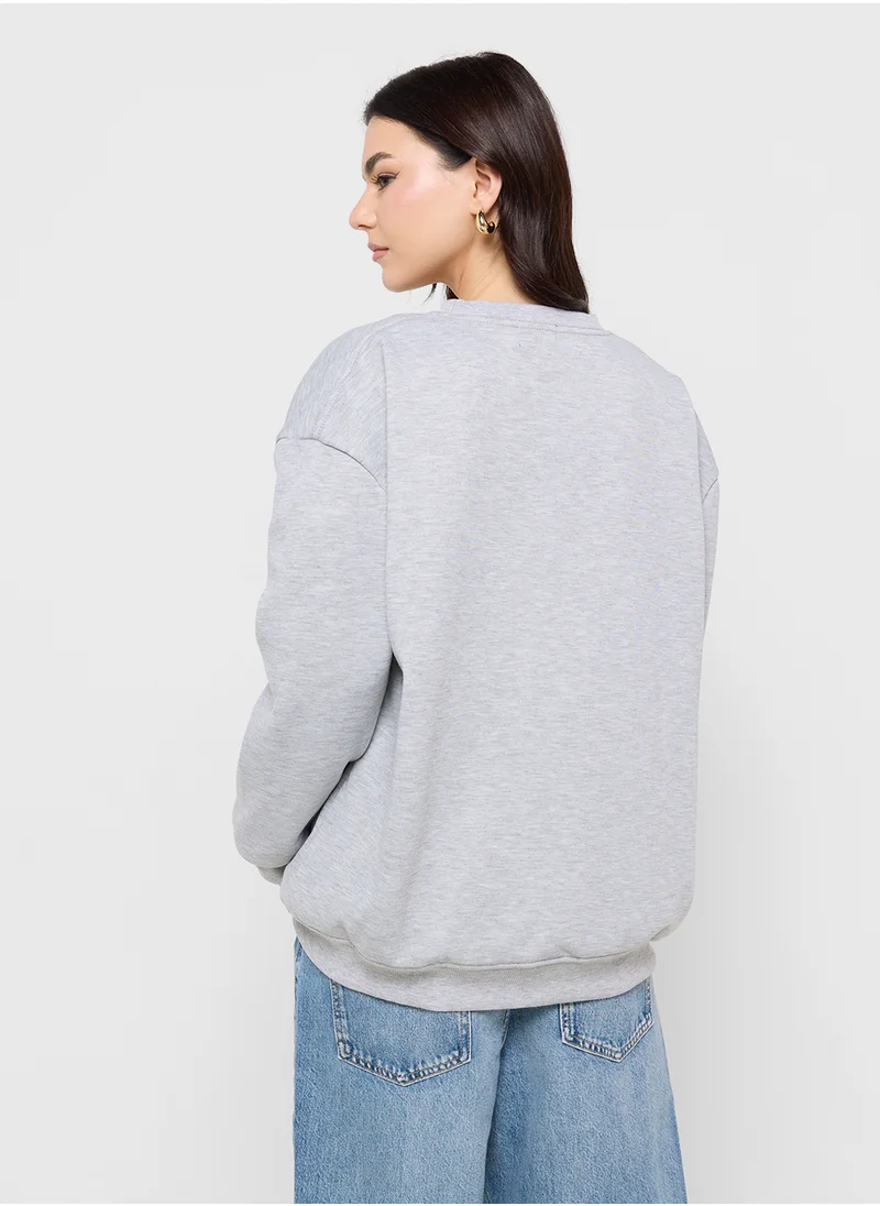 جينجر Oversized Embroidered Slogan Sweatshirt