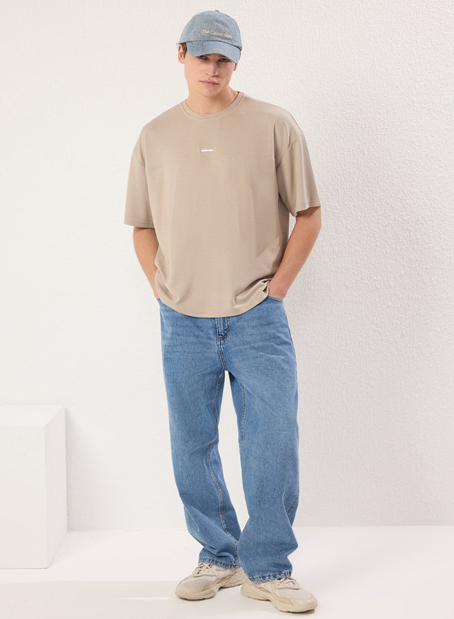 trendyol stone Oversize/Wide Cut Metal Label Detail Soft Tissue Interlock Fabric T-Shirt - Image 1