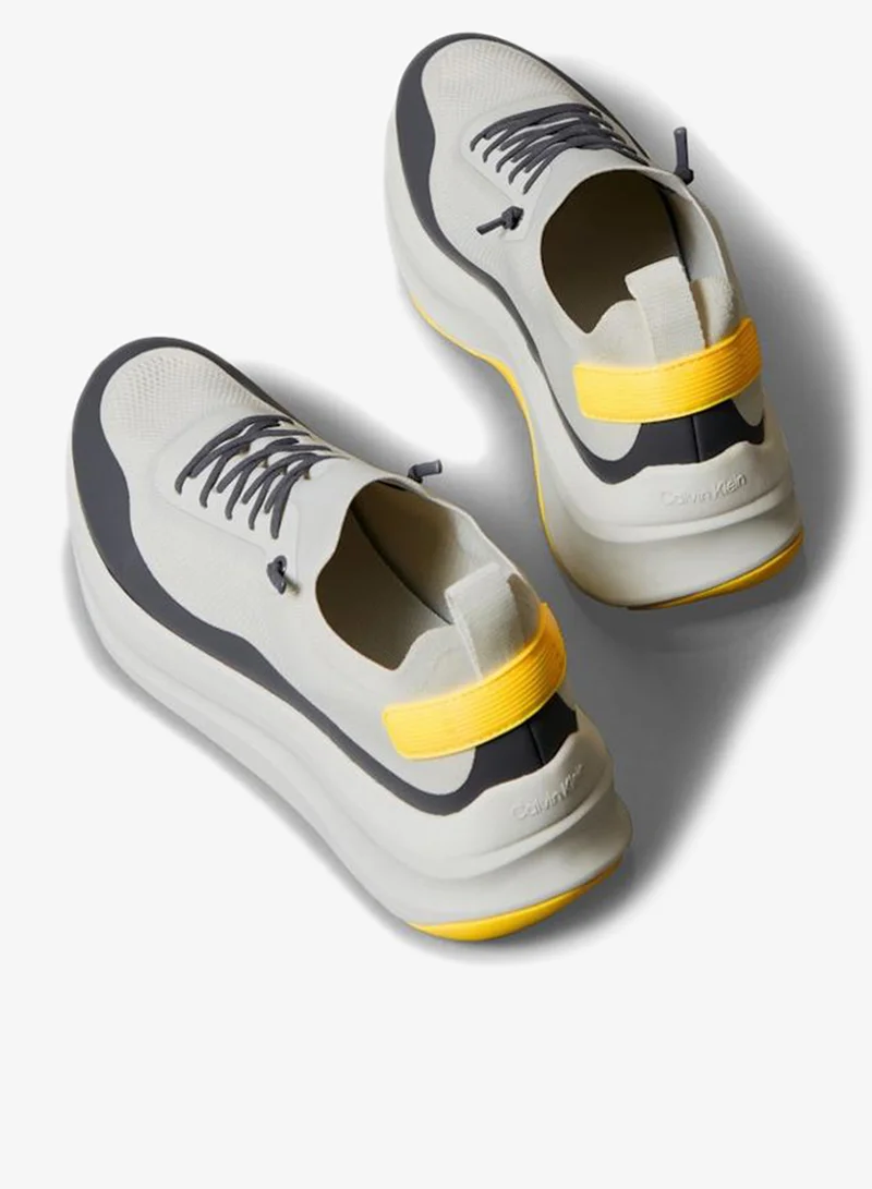 Calvin Klein Jeans Vaporous White/Coal/Buttercup Andrea Low Top Chunky Sneakers for Men | Best Price UAE