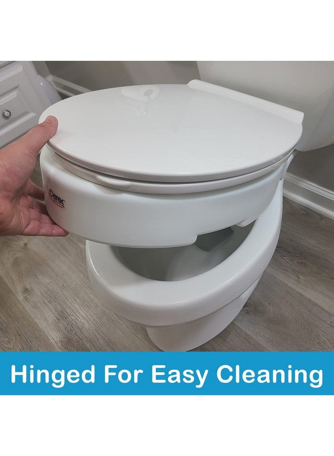 careX Carex Round Hinged Raised Toilet Seat, Elongated Toilet Seat Riser, Adds 3.5 Inches of Height, 300 lbs Capacity, Elevating and Raising Seat for Elderly and Handicap, Universal, Slip-Resistant, White - Image 1