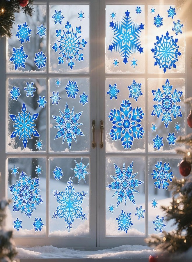 كونسيت مجموعة كونسايت من 112 قطعة من ملصقات النوافذ على شكل ندفة ثلجية بألوان قوس قزح، ملصقات مزدوجة الجوانب لنوافذ عيد الميلاد، لحماية الزجاج من اصطدام الطيور، ديكور أزرق لعيد الميلاد، ملصقات ثابتة قابلة لإعادة الاستخدام لتزيين الشتاء - Image 2