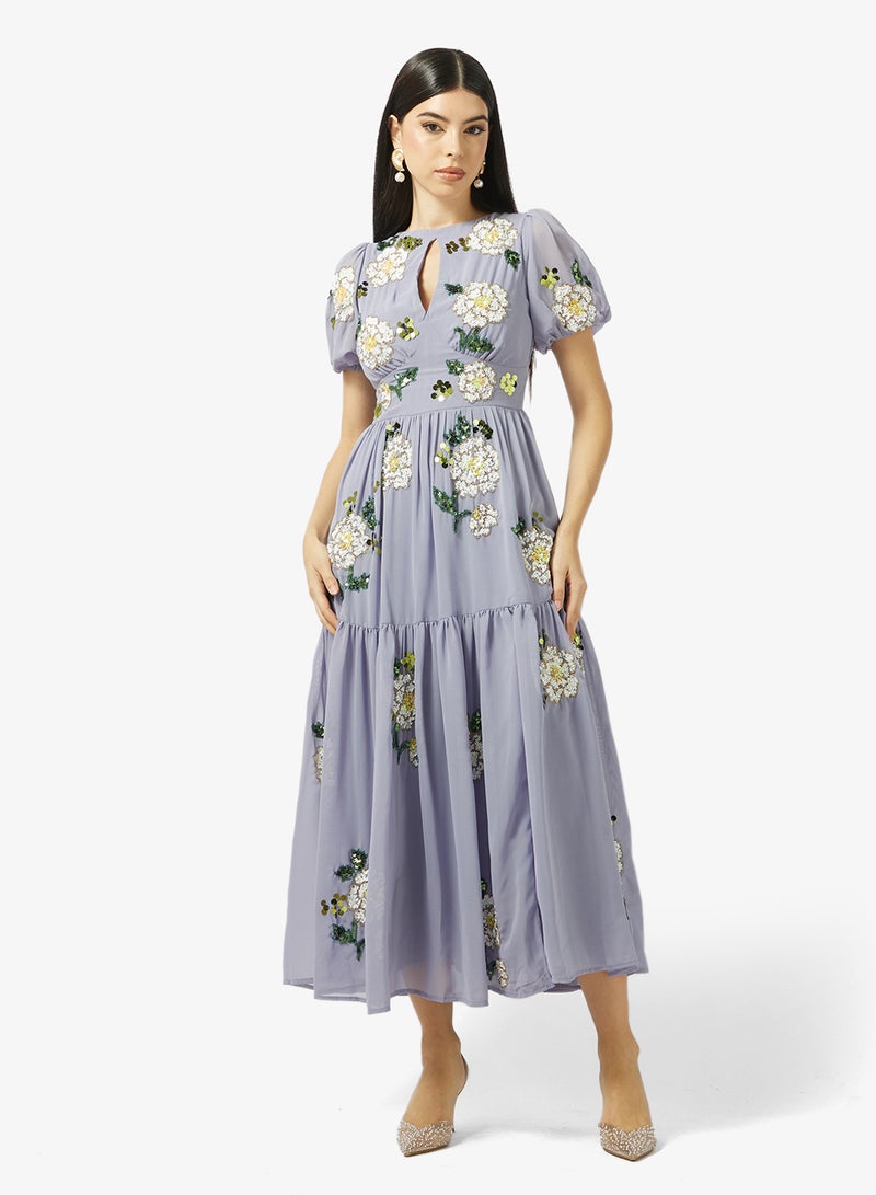 مايا فستان ماكسي بأكمام منفوشة وزخارف زهور متباينة - Image 1