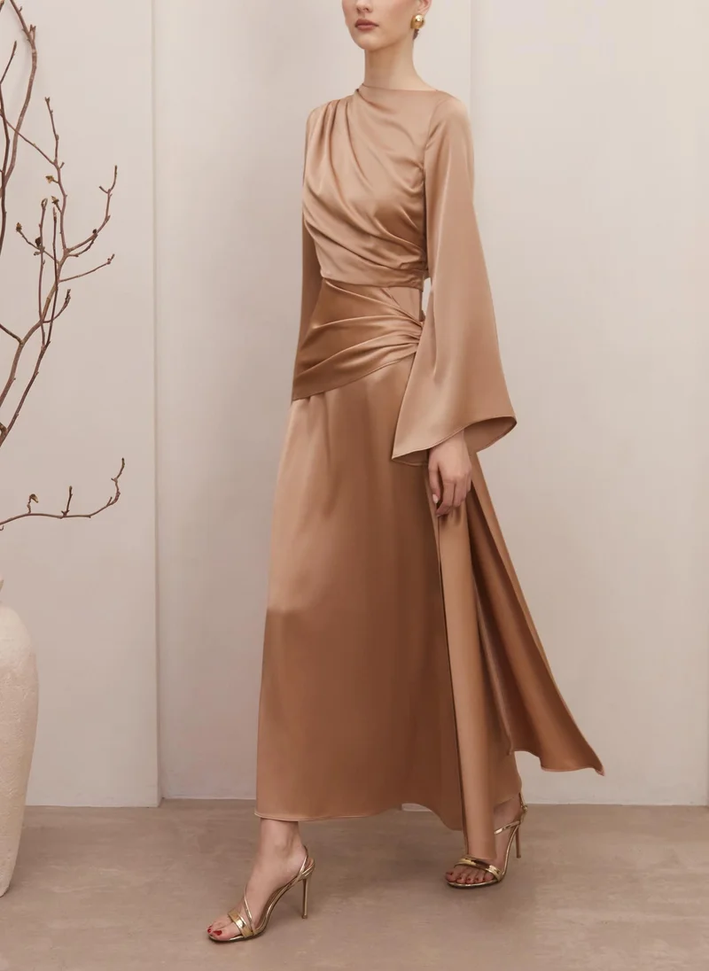 Maxi satin dress with long sleeves and asymmetrical draping