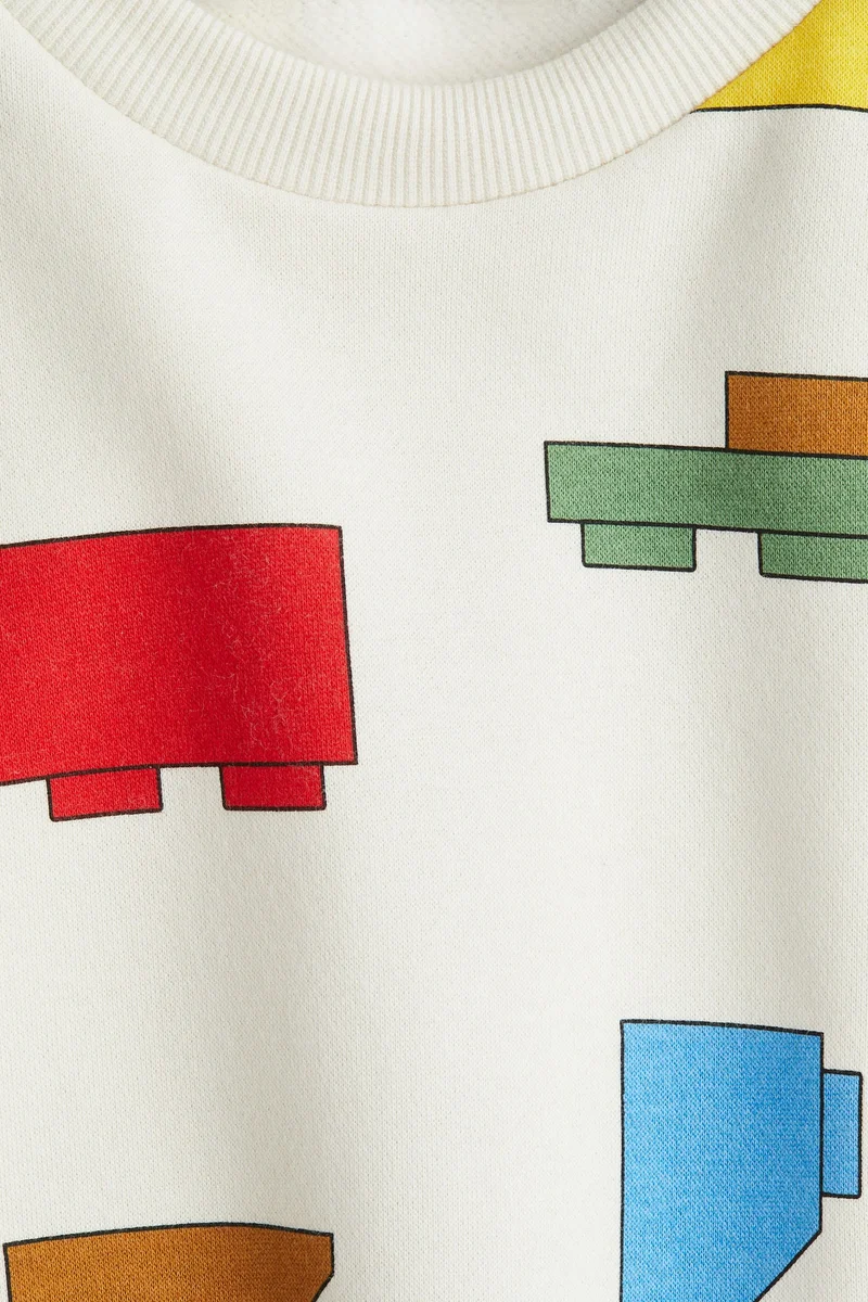 اتش اند ام سويت شيرت فضفاضة ذات طبعة