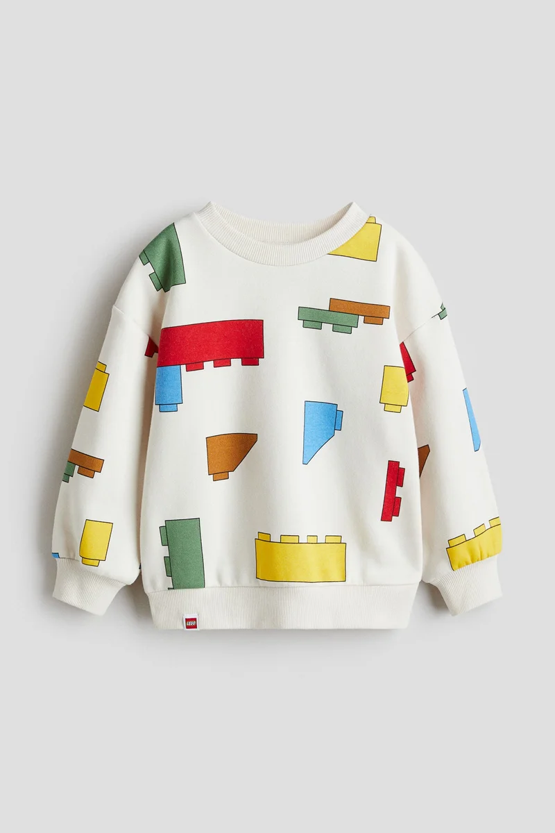 اتش اند ام سويت شيرت فضفاضة ذات طبعة