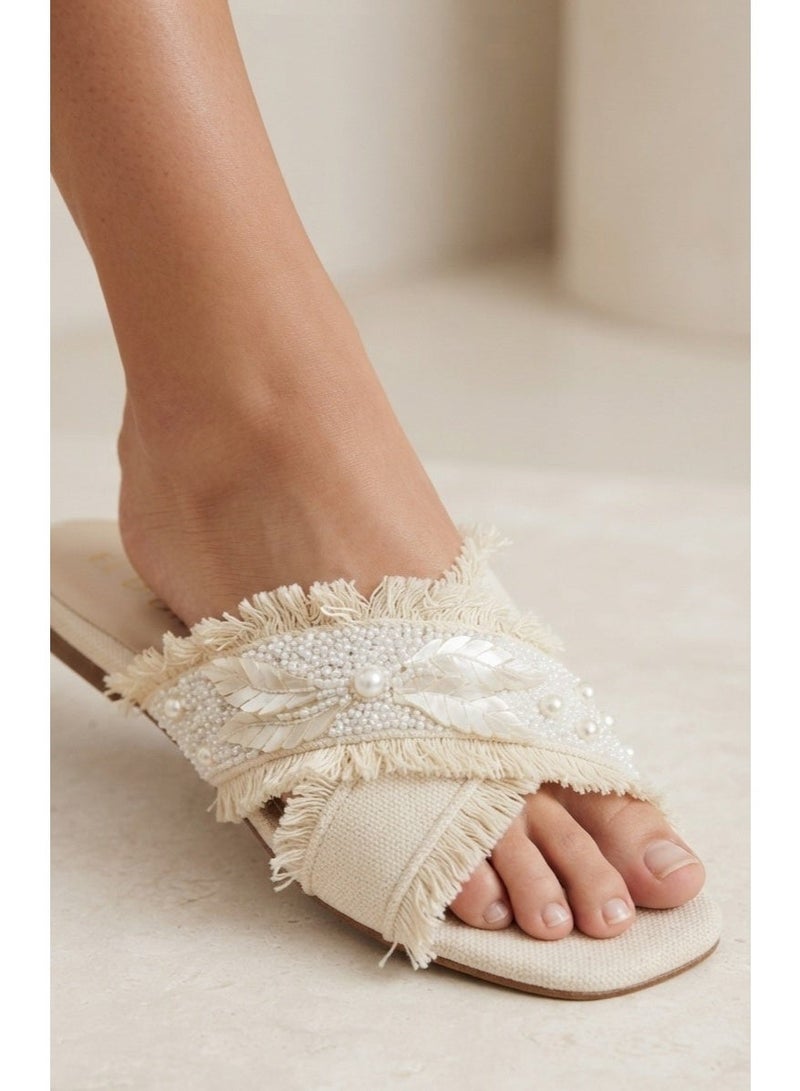 Summer slippers with a crisscross strap design and pearl embroidery - Image 1