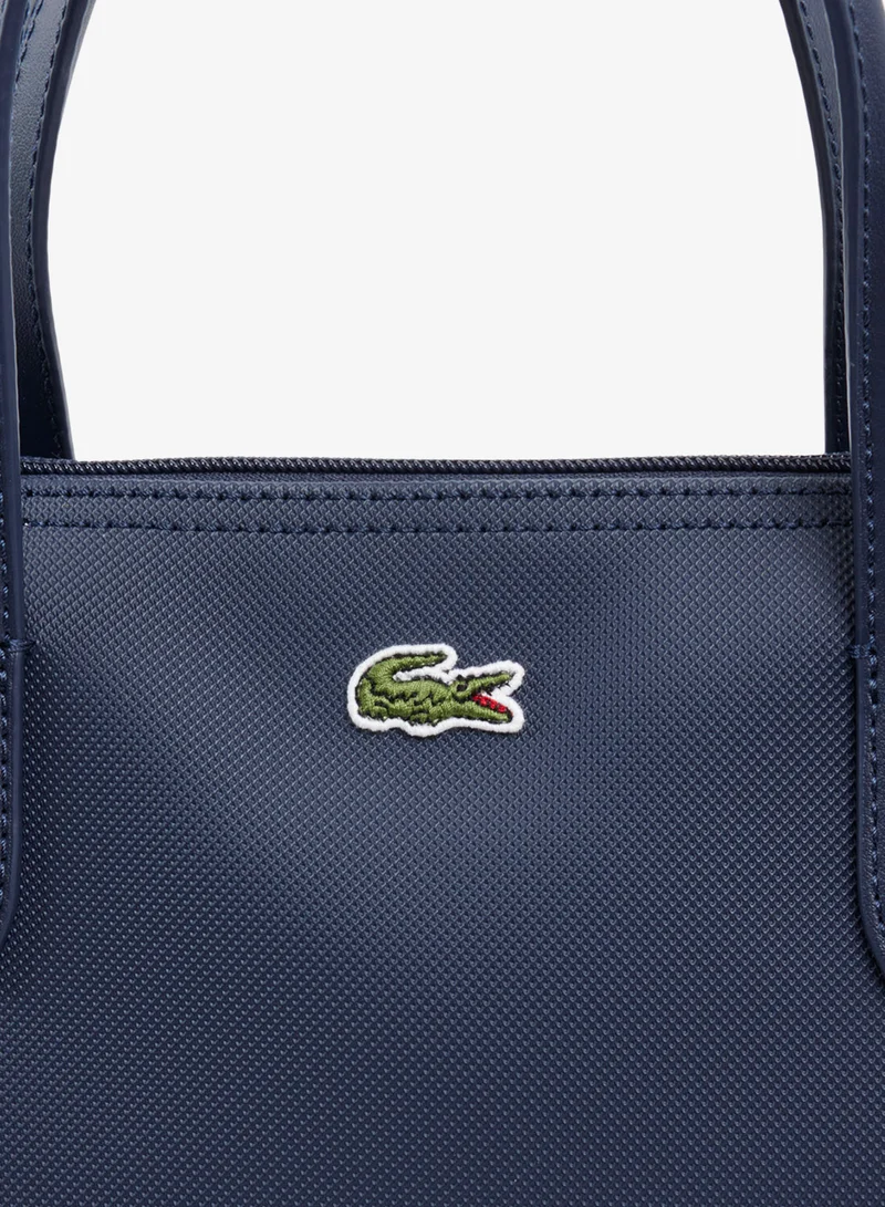 Lacoste  The iconic shopping crossover bag for Women | Best Price UAE