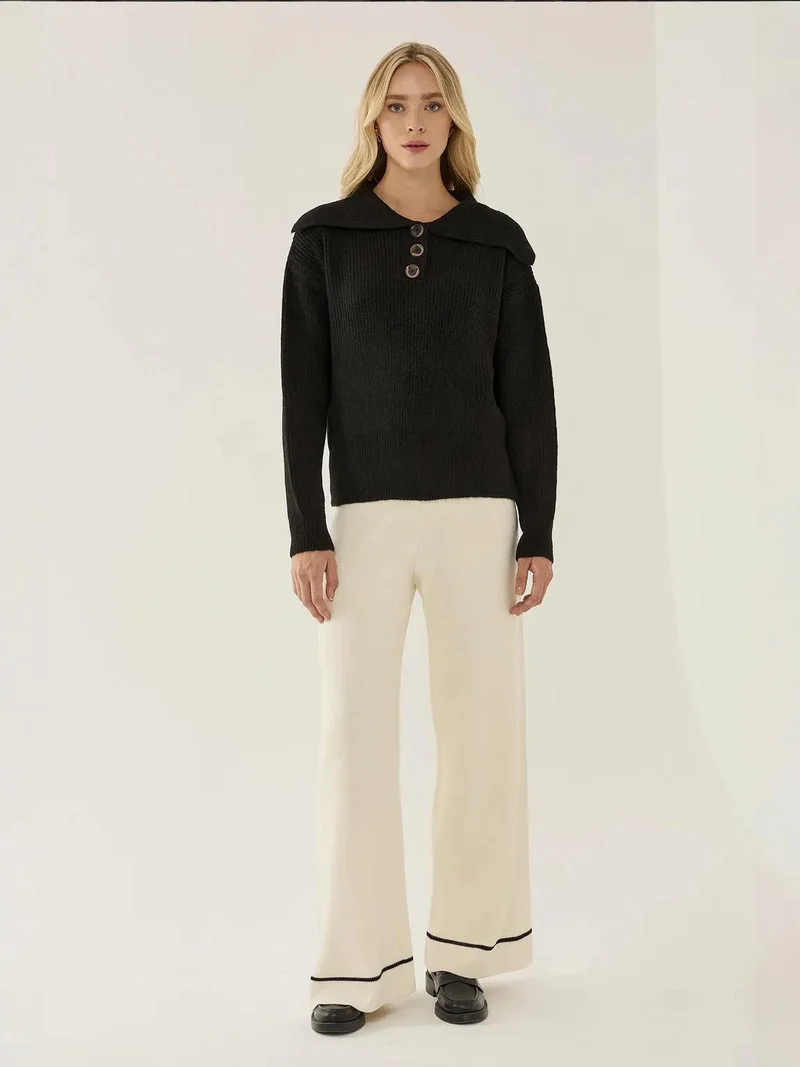 زوبعة كنزة بياقة شال وأزرار