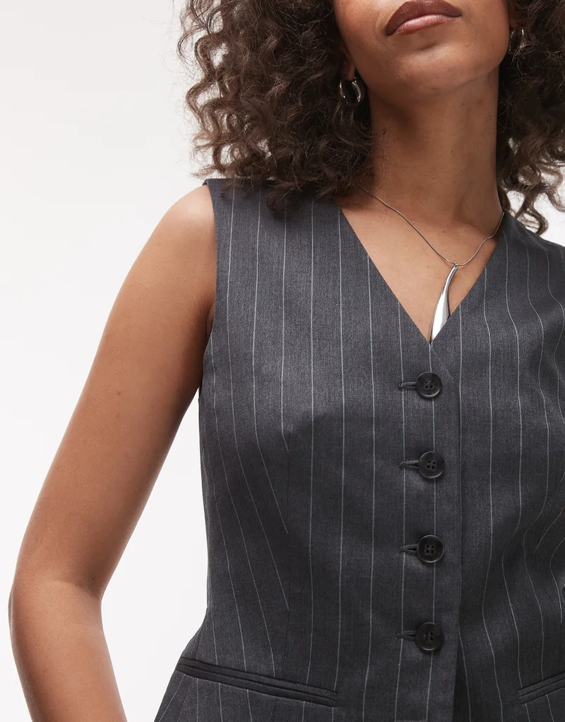 توب شوب Topshop سترة فيست ضيقة بياقة V مخططة