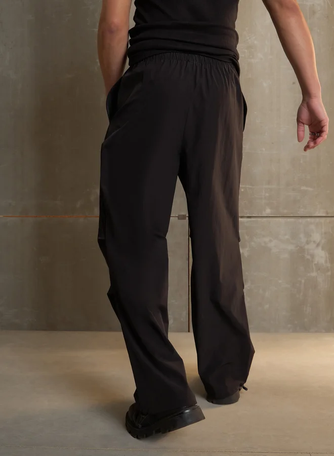 SASSAFRAS Front Invert Pleat Baggy Parachute Pants