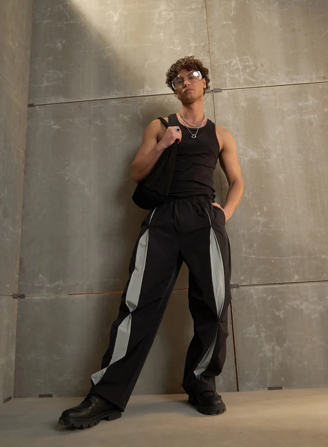 SASSAFRAS Front Invert Pleat Baggy Parachute Pants