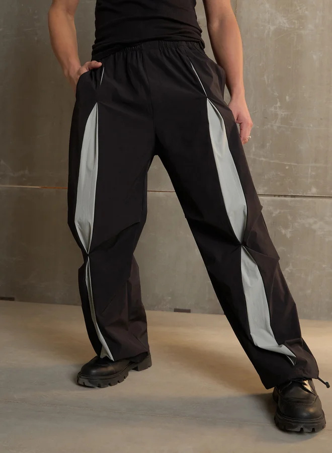 SASSAFRAS Front Invert Pleat Baggy Parachute Pants