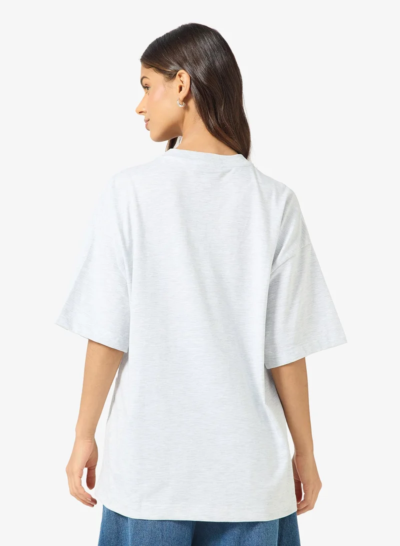 توب شوب تيشيرت واسع بكتف ساقط