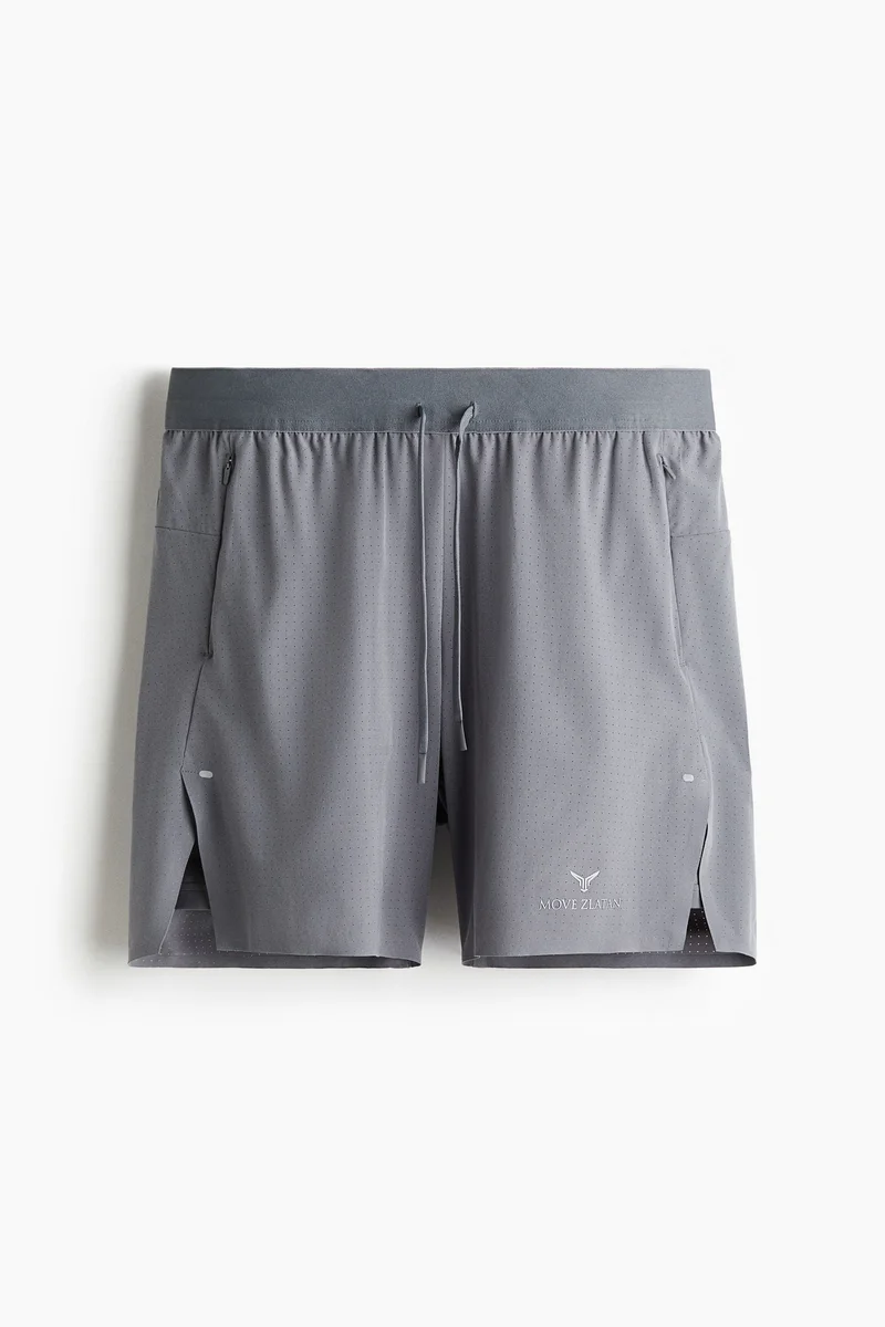 اتش اند ام Double-layered sports shorts with DryMove™