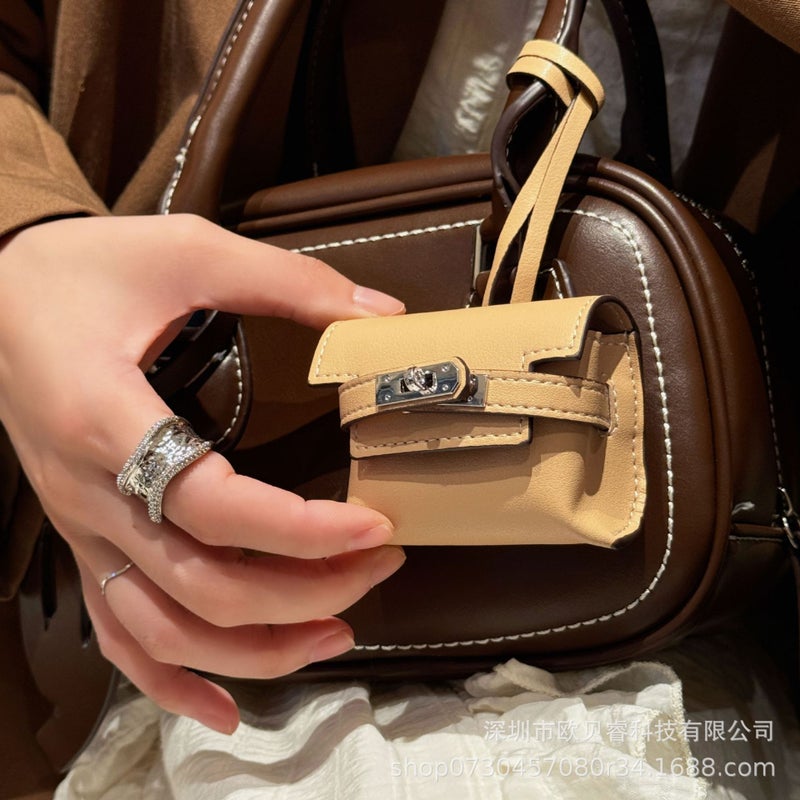 Mini Kelly Bluetooth Headset Bag Fashion Creative Dumpling Bag Pendant Car Rear Mirror Hanging - Image 1