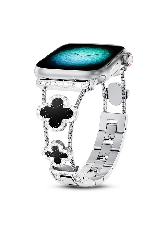 O Ozone سوار معدني لساعة أبل 40 مم و41 مم و38 مم، أحزمة بديلة مزينة بزهرة البرسيم الرائعة ذات الأربع أوراق، سلسلة 9 و8 و7 و6 و5 و4 و3 و2 و1 SE للنساء - فضي وأسود - Image 1