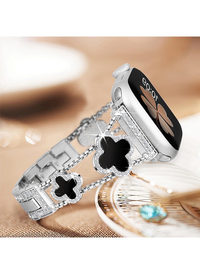 O Ozone سوار معدني لساعة أبل 40 مم و41 مم و38 مم، أحزمة بديلة مزينة بزهرة البرسيم الرائعة ذات الأربع أوراق، سلسلة 9 و8 و7 و6 و5 و4 و3 و2 و1 SE للنساء - فضي وأسود - Image 4