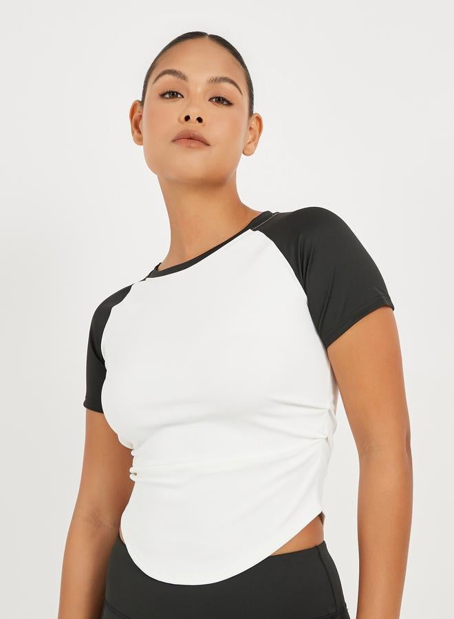 Styli Color Block Side Ruched Curved Hem Short Sleeve Top  - Image 1