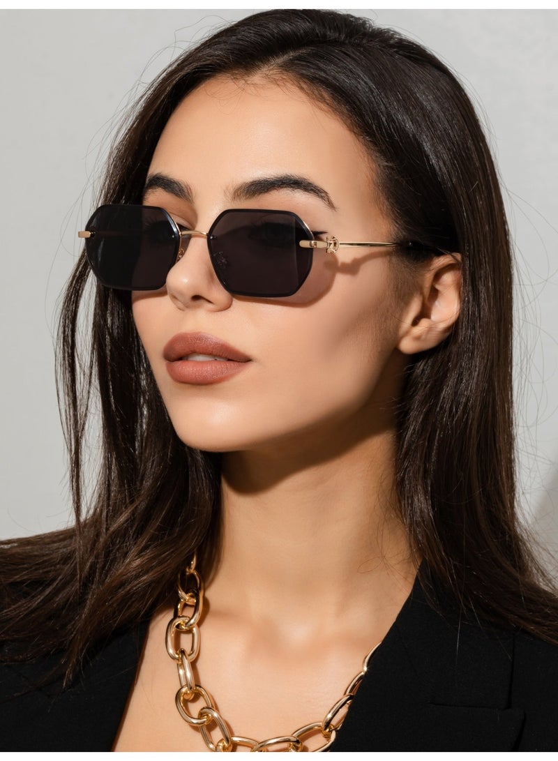 نظارات شمسية نسائية بإطار هندسي عصري – عدسات داكنة وإطار معدني أنيق للحماية والأناقة - Image 1