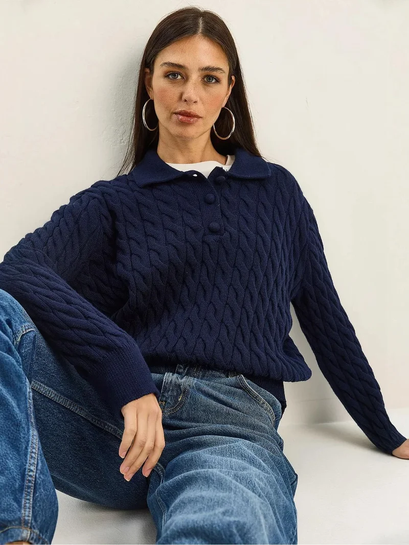 بيانكو لوتشي كنزة بولو برقبة ضيقة بنقش جديلة سميكة من لوتشي