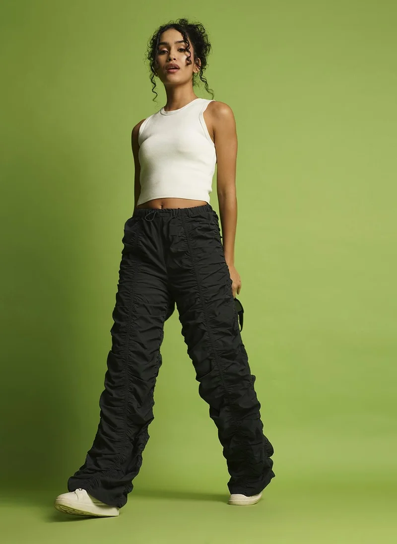 جلو باص بنطلون كارغو نسائي فضفاض مموه