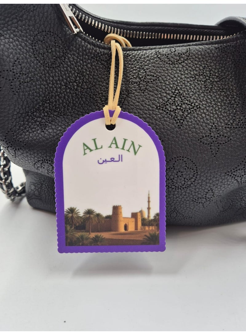 Passion District Bag hanging charm made of acrylic with castel design in Alain city - Image 3