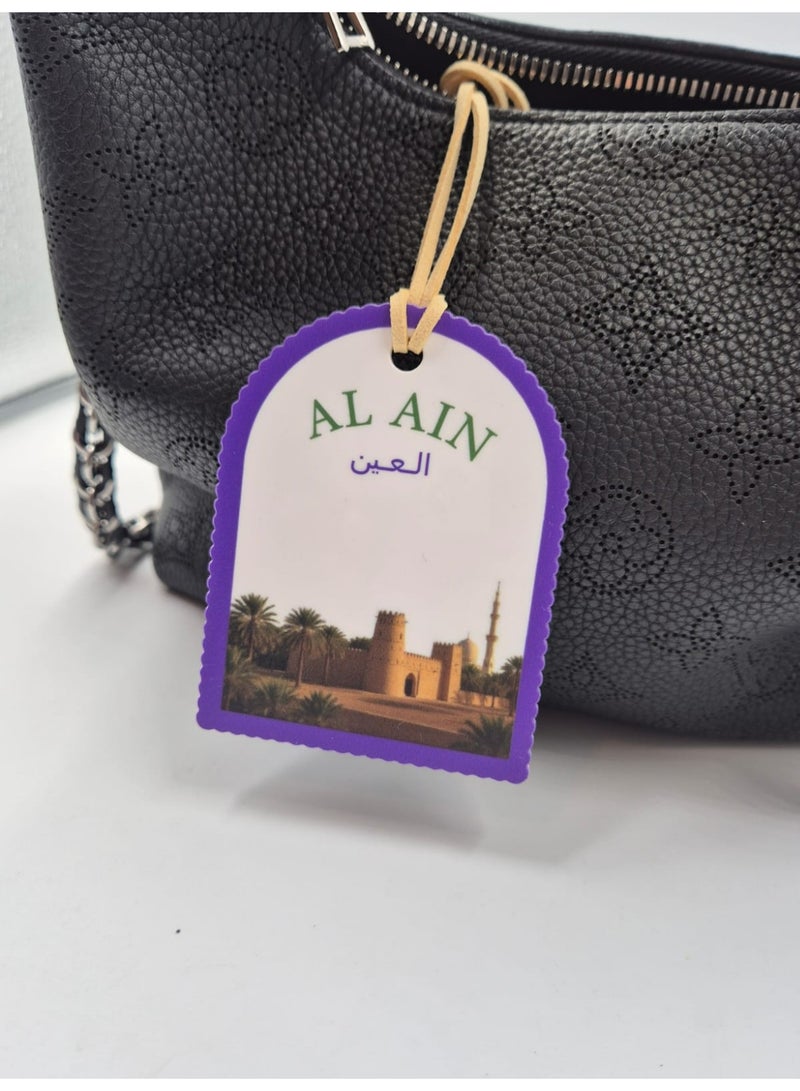 Passion District Bag hanging charm made of acrylic with castel design in Alain city - Image 1