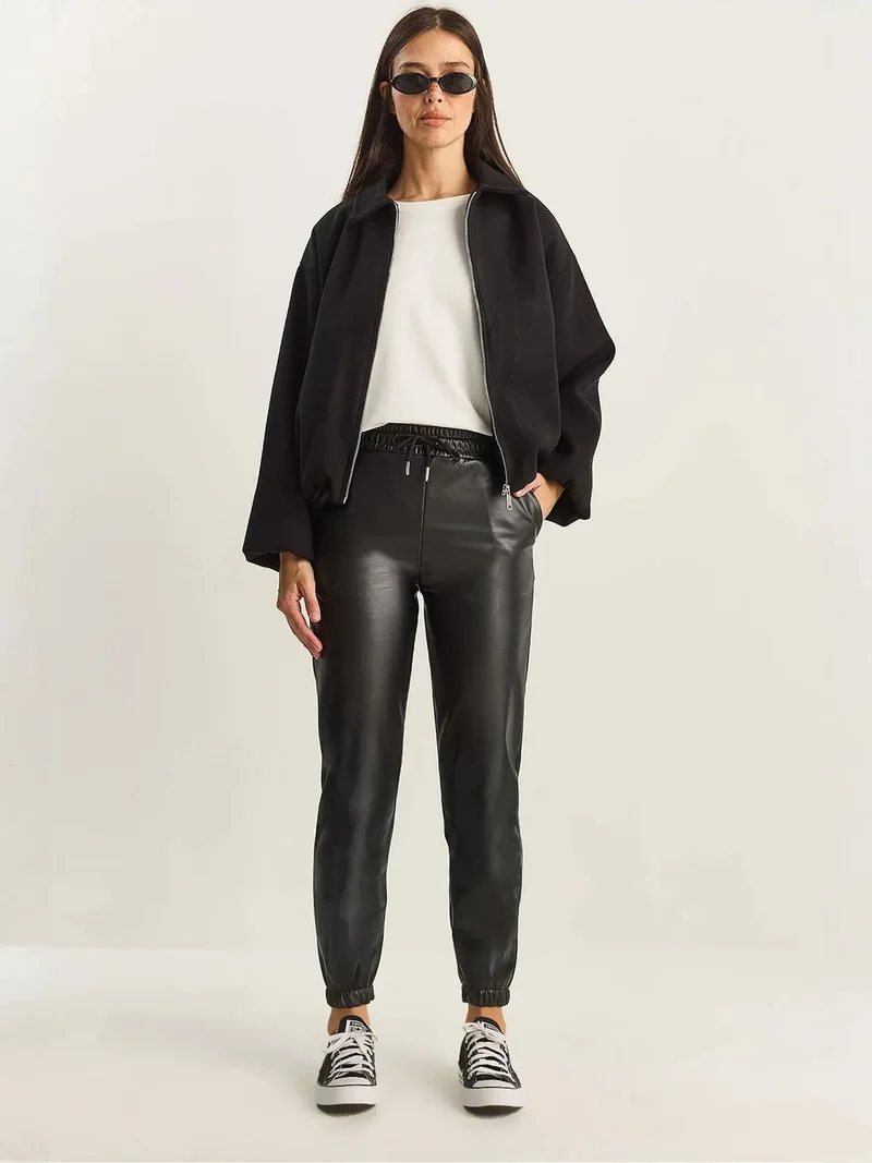 بيانكو لوتشي LUCCI Faux Leather Jogger Pants with Tie Closure