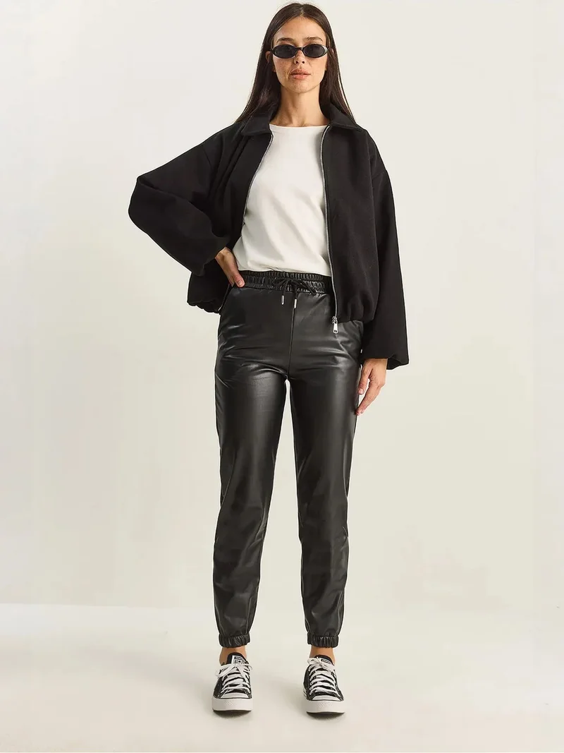 بيانكو لوتشي LUCCI Faux Leather Jogger Pants with Tie Closure