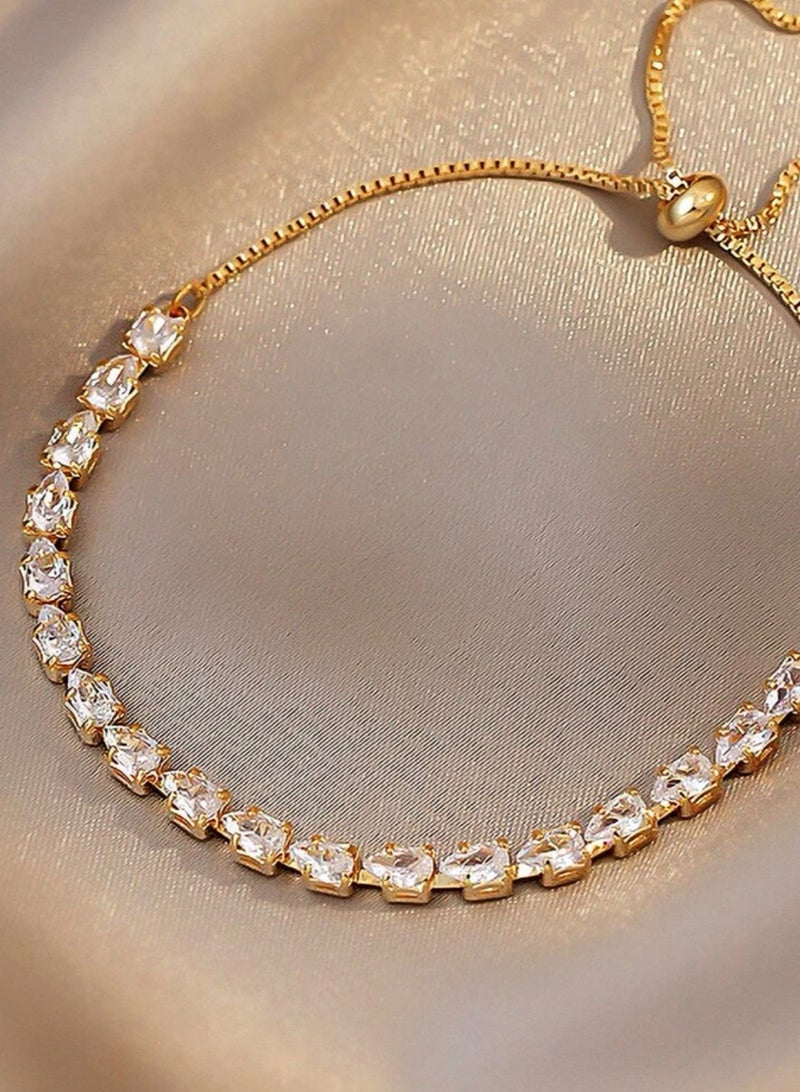 إيكوال اسوارة نسائية أنيقة وفاخرة باللون الذهبي مرصعة بالزركون - Image 2