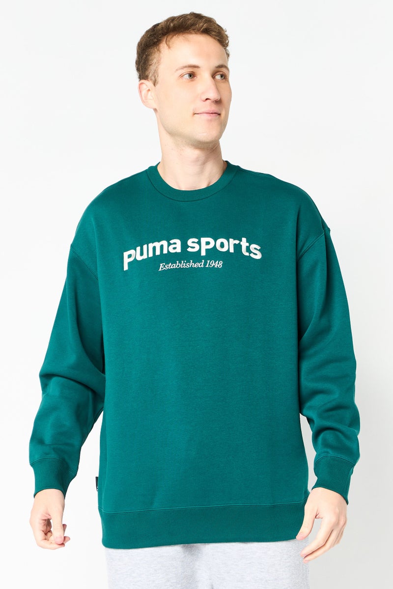 PUMA سويت شيرت رياضي للرجال بأكمام طويلة مناسب في الهواء الطلق، أخضر مائل إلى الأزرق - Image 1