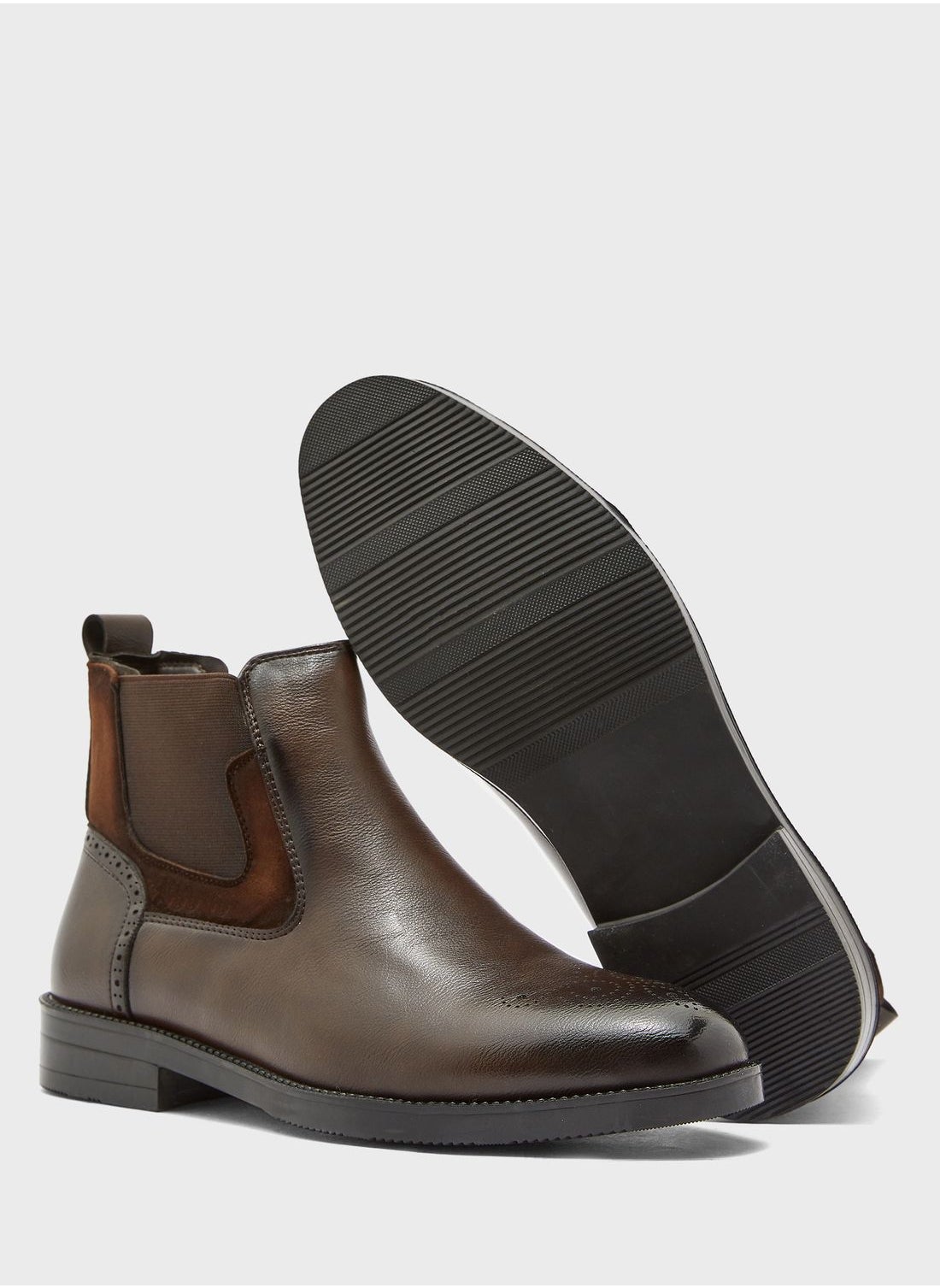 Chelsea Boots - https://f.nooncdn.com/p/pzsku/Z6188C5D246730EE8B1C6Z/45/_/1691879349/d0a334b0-5594-484c-aefd-792c32ecba59.jpg?format=jpg&width=original