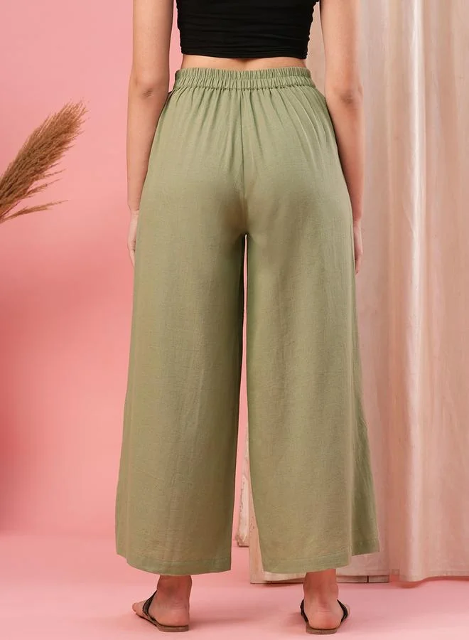 Globus Olive Mid Rise Semi Elastic Waist Opaque Wide Leg Palazzos for Women | Best Price UAE