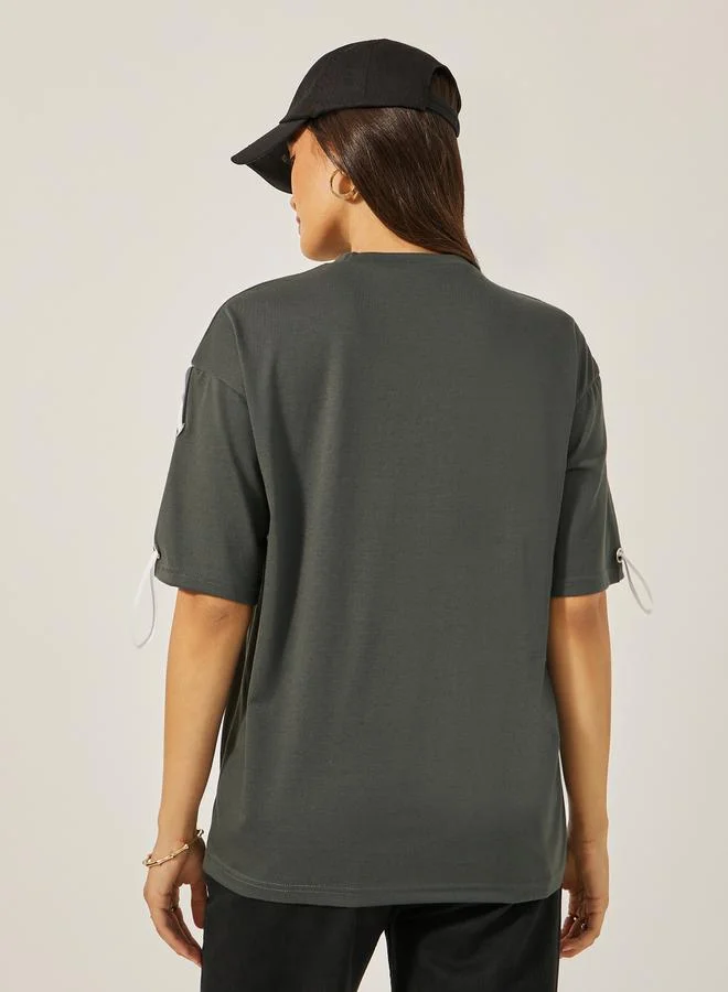 Styli Oversized Round Neck T-Shirt with Tape Detail