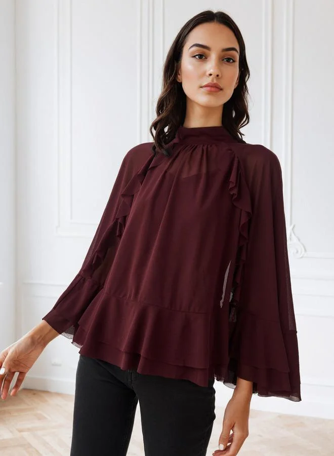 ايكونيك بلوزة كاب بأكتاف مكشكشة أيقونية