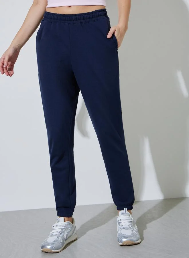 ستايلي Navy Blue Solid Mid-Rise Cuffed Joggers