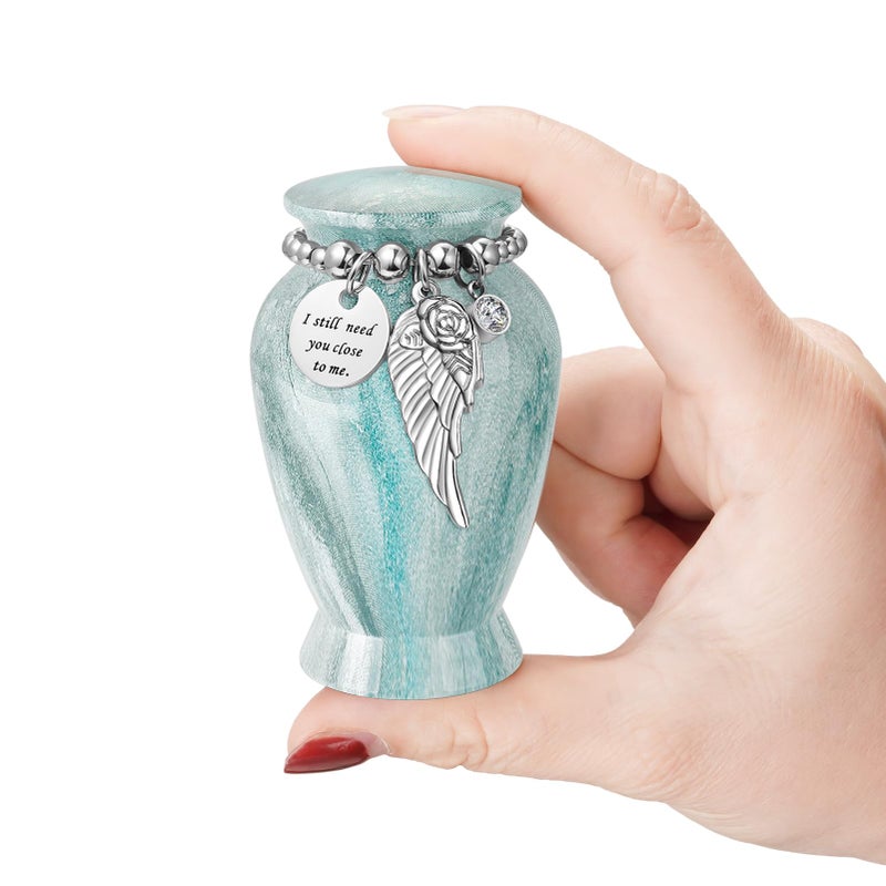 XIUDA Memorials Small Urns for Human Ashes Keepsake Aluminum Mini Urns for Ashes with Angel Wing Charm Decorative Burial Urn Funeral Cremation Urns for Women and Men (Light Green) - Image 1