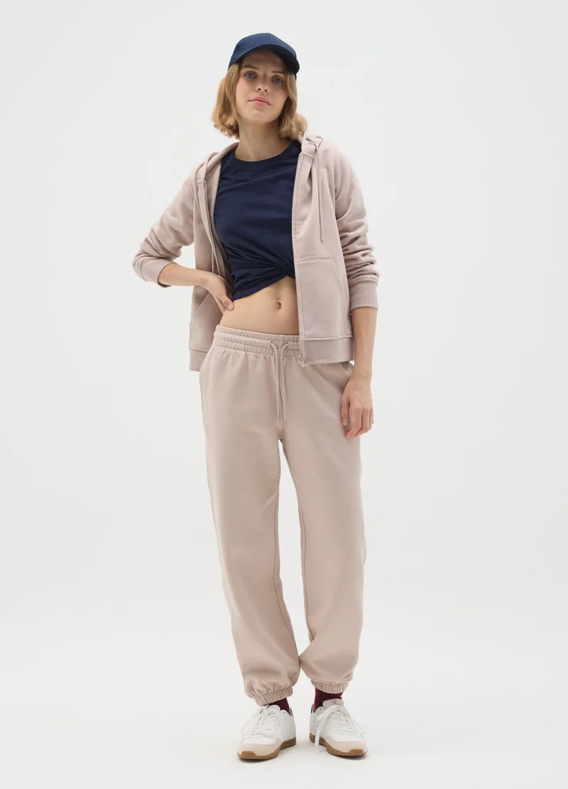 او في اس كنزة قطنية مريحة بيج