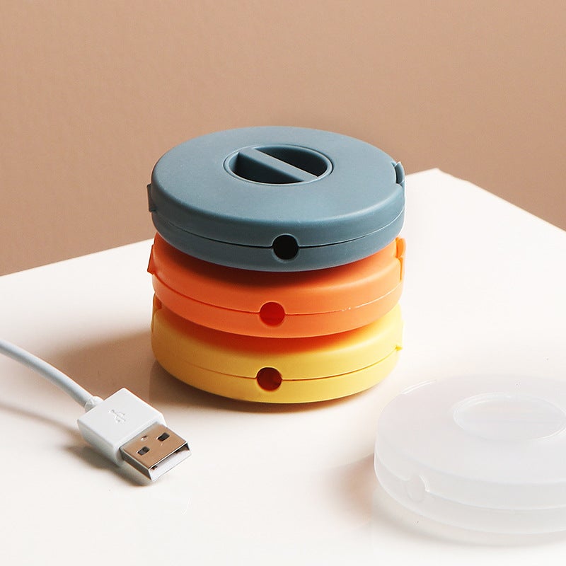Small And Portable Portable Round Rotatable Data Cable Storage Box Mobile Phone Charging Cable Winder - Image 4