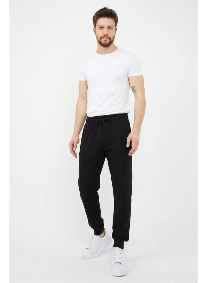 Mmetalic  Black Men's Ribbed Cuff Sweatpants with Zip Pocket Details for Men | Best Price UAE