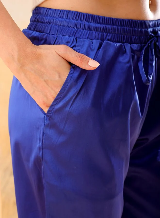 مرفوعة Women Flared Solid High-Rise  Pants
