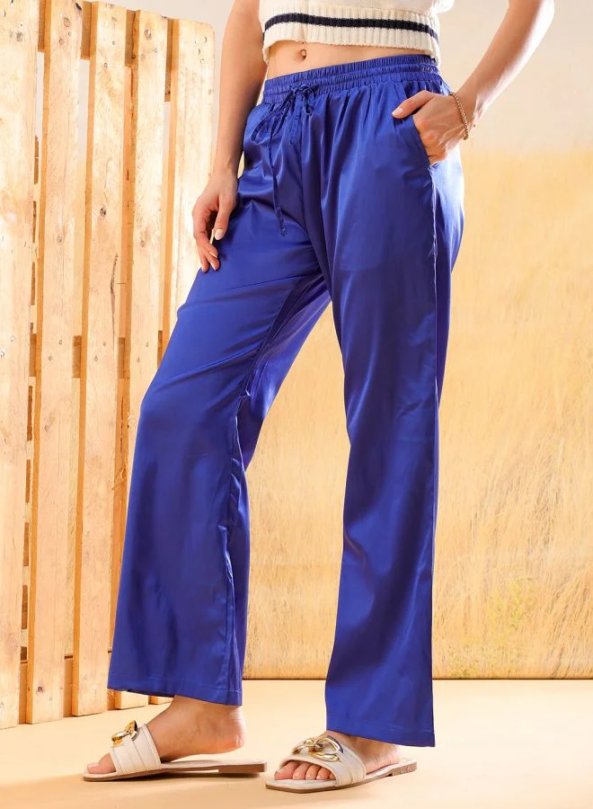 مرفوعة Women Flared Solid High-Rise  Pants