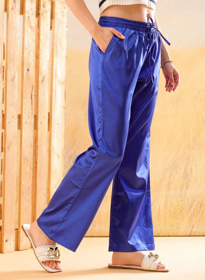مرفوعة Women Flared Solid High-Rise  Pants