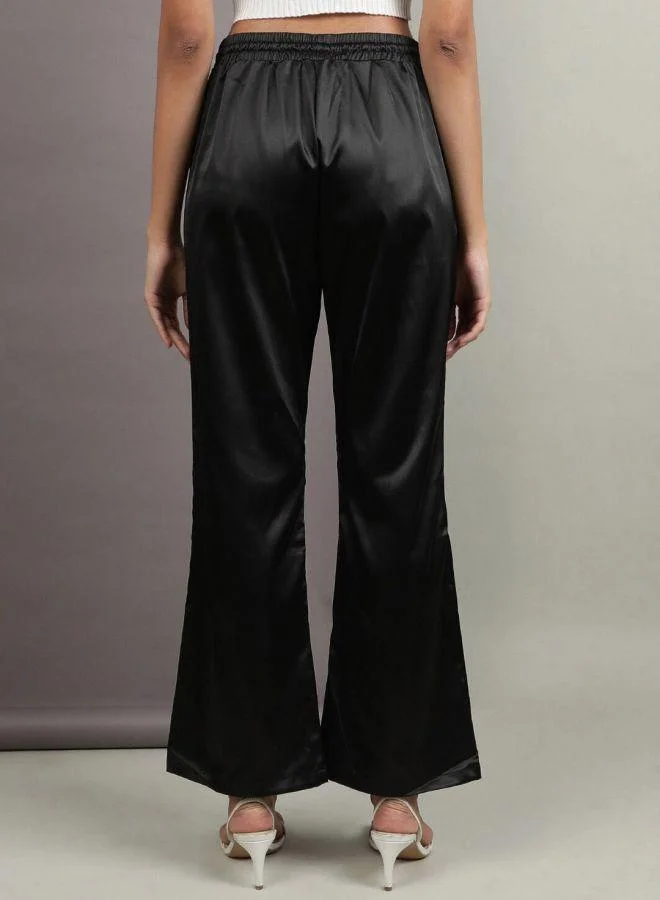 مرفوعة Women Flared Solid High-Rise  Pants