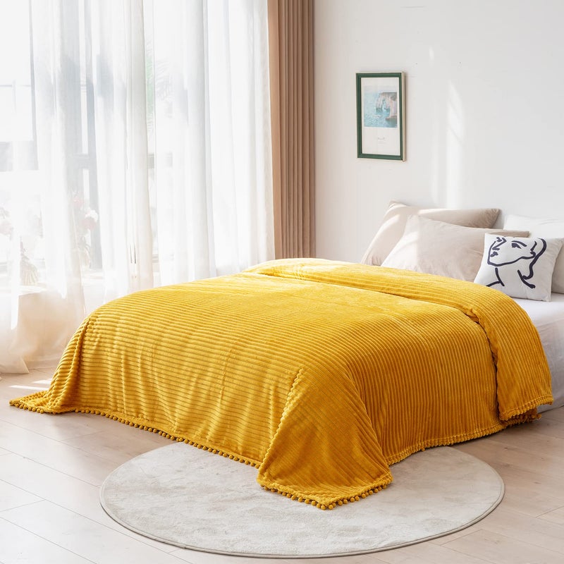 DISSA Fleece Blanket Throw Size â€“ 51x63, Yellow Soft, Plush, Fluffy, Fuzzy, Warm, Cozy Perfect for Couch, Bed, Sofa - with Pompom Fringe Flannel - Image 5
