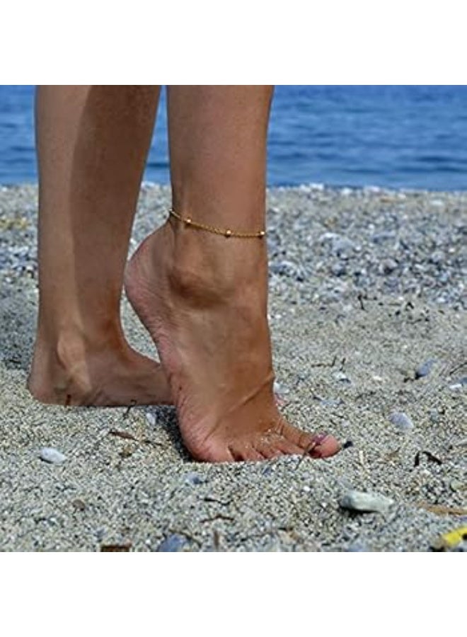 Luxuria A simple and delicate gold anklet studded with small spherical beads distributed along the chain, the "satellite" anklet. - Image 2